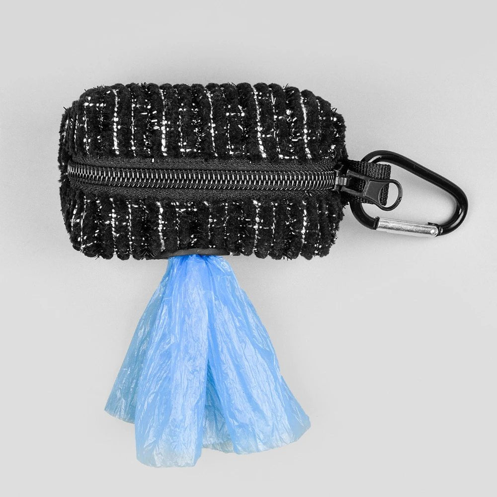 Dress up every walk with this chic poop bag holder, a stylish little accessory that clips effortlessly onto any leash or handbag. - Luxempirez