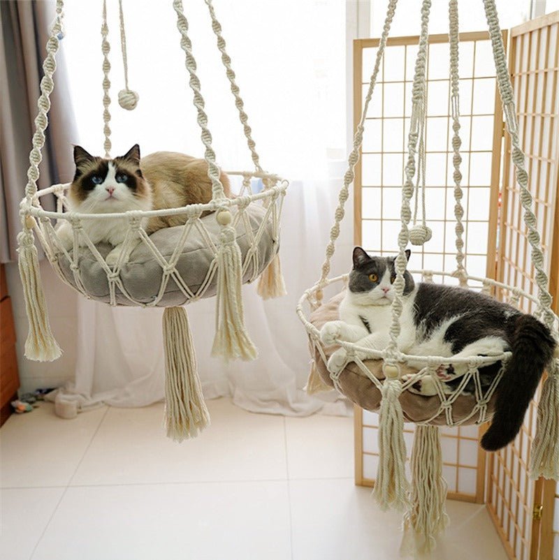 Give your feline a sanctuary in the sky with this hand‑woven luxury cat hammock, designed to float elegantly in your home like a piece of boho décor. The soft, suspended nest cradles your cat in complete comfort, while the exquisite macramé detailing. - Luxempirez