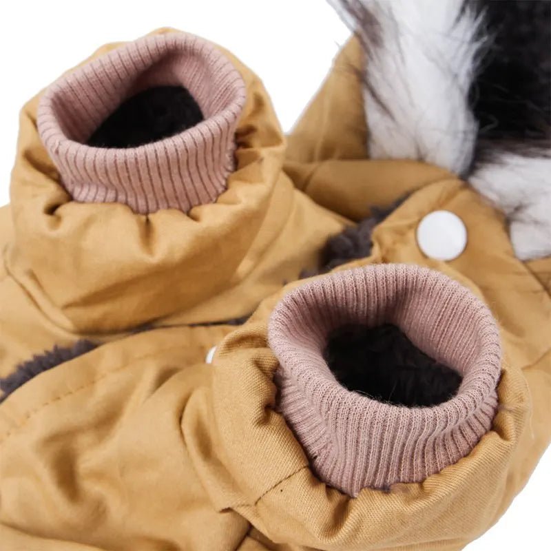 Indulge your canine companion with this exquisite dog jacket, designed for ultimate comfort and style. With its plush fleece lining and sophisticated faux fur hood trim, this piece combines warmth and elegance to perfection. - Luxempirez