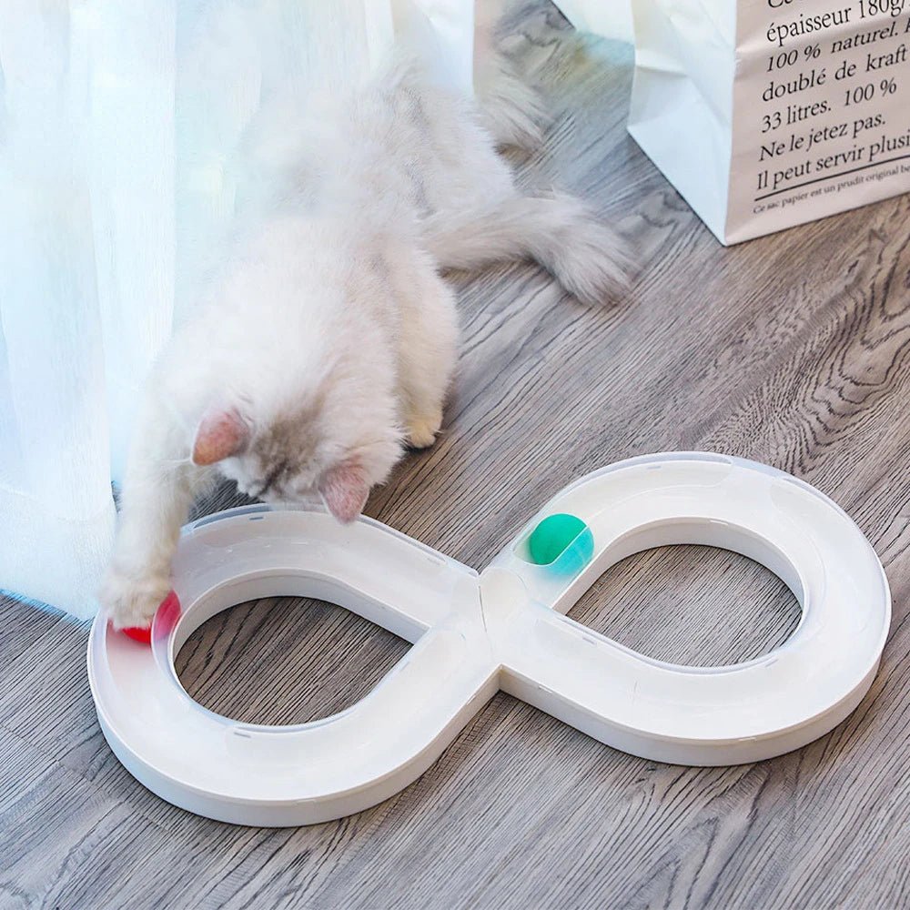 Keep your cat active and entertained with this sleek infinity - track toy, featuring colorful rolling balls that stimulate natural hunting instincts. A stylish, space - saving design that turns playtime into pure feline joy. - Luxempirez