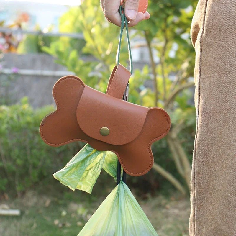 Keep your walks stylish and stress - free with this bone - shaped poop bag holder in premium faux leather. - Luxempirez