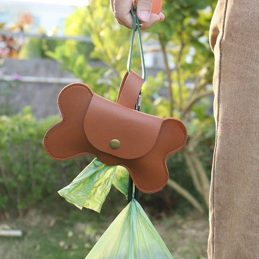 Keep your walks stylish and stress - free with this bone - shaped poop bag holder in premium faux leather. - Luxempirez