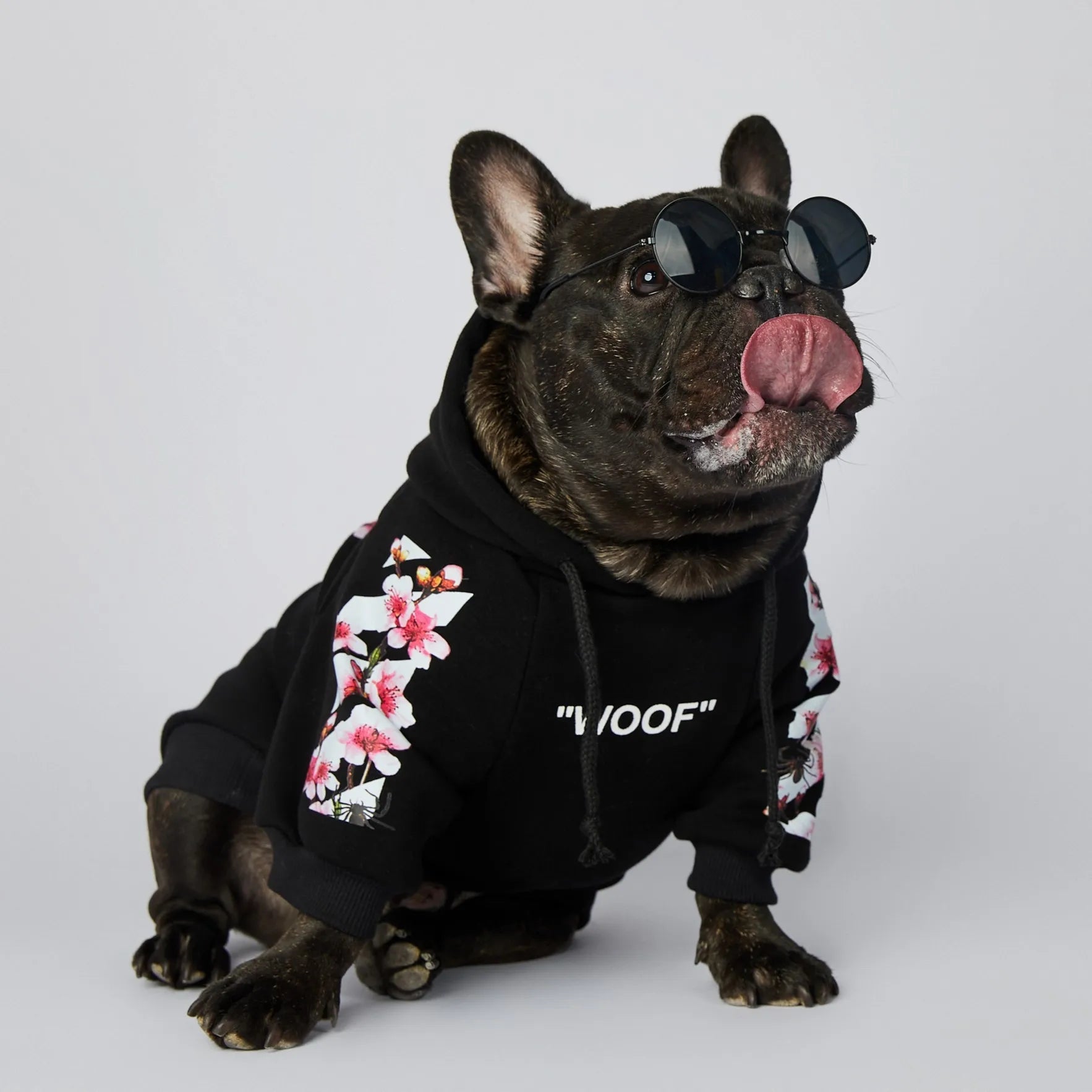 Let your dog make a statement in this luxurious black hoodie, adorned with intricate floral motifs and bold design accents front and back. The high - quality fabric ensures lasting comfort and warmth, while the unique aesthetic featuring "WOOF". - Luxempirez