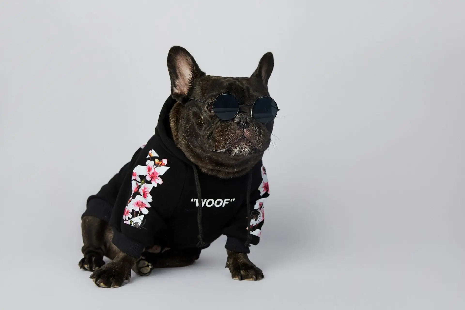 Let your dog make a statement in this luxurious black hoodie, adorned with intricate floral motifs and bold design accents front and back. The high - quality fabric ensures lasting comfort and warmth, while the unique aesthetic featuring "WOOF". - Luxempirez