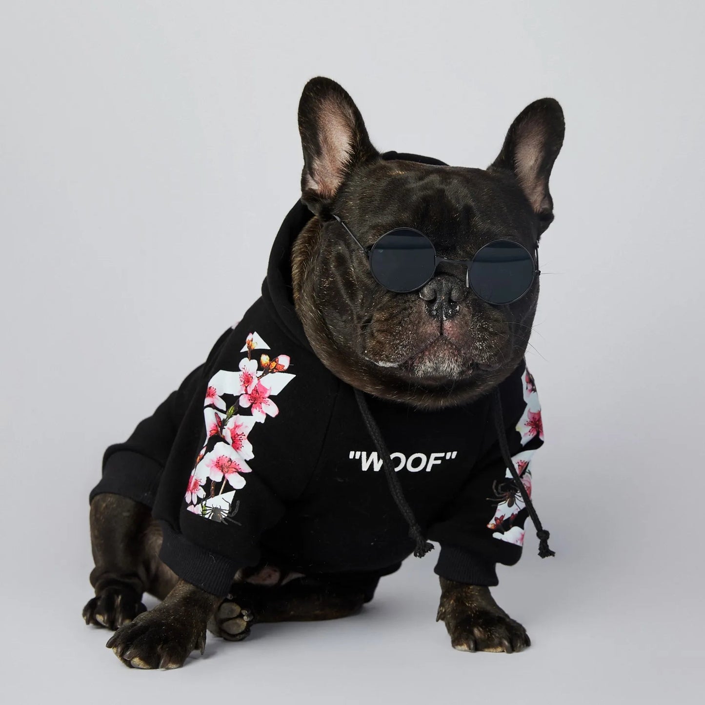 Let your dog make a statement in this luxurious black hoodie, adorned with intricate floral motifs and bold design accents front and back. The high - quality fabric ensures lasting comfort and warmth, while the unique aesthetic featuring "WOOF". - Luxempirez