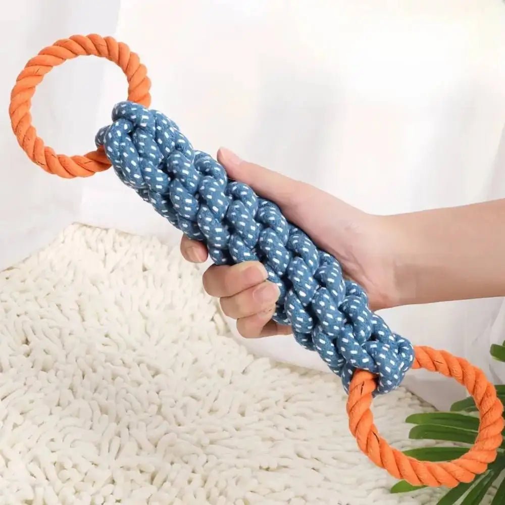 Made from 100% natural cotton, this heavy‑duty rope toy stands up to aggressive chewers while cleaning teeth and reducing plaque naturally. Ideal for interactive tug games, solo fidgeting, or fetch, it keeps your dog entertained and supports healthy gums - Luxempirez