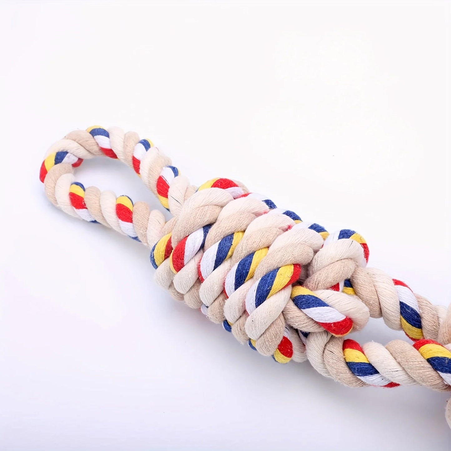 Made from 100% natural cotton, this heavy‑duty rope toy stands up to aggressive chewers while cleaning teeth and reducing plaque naturally. Ideal for interactive tug games, solo fidgeting, or fetch, it keeps your dog entertained and supports healthy gums - Luxempirez