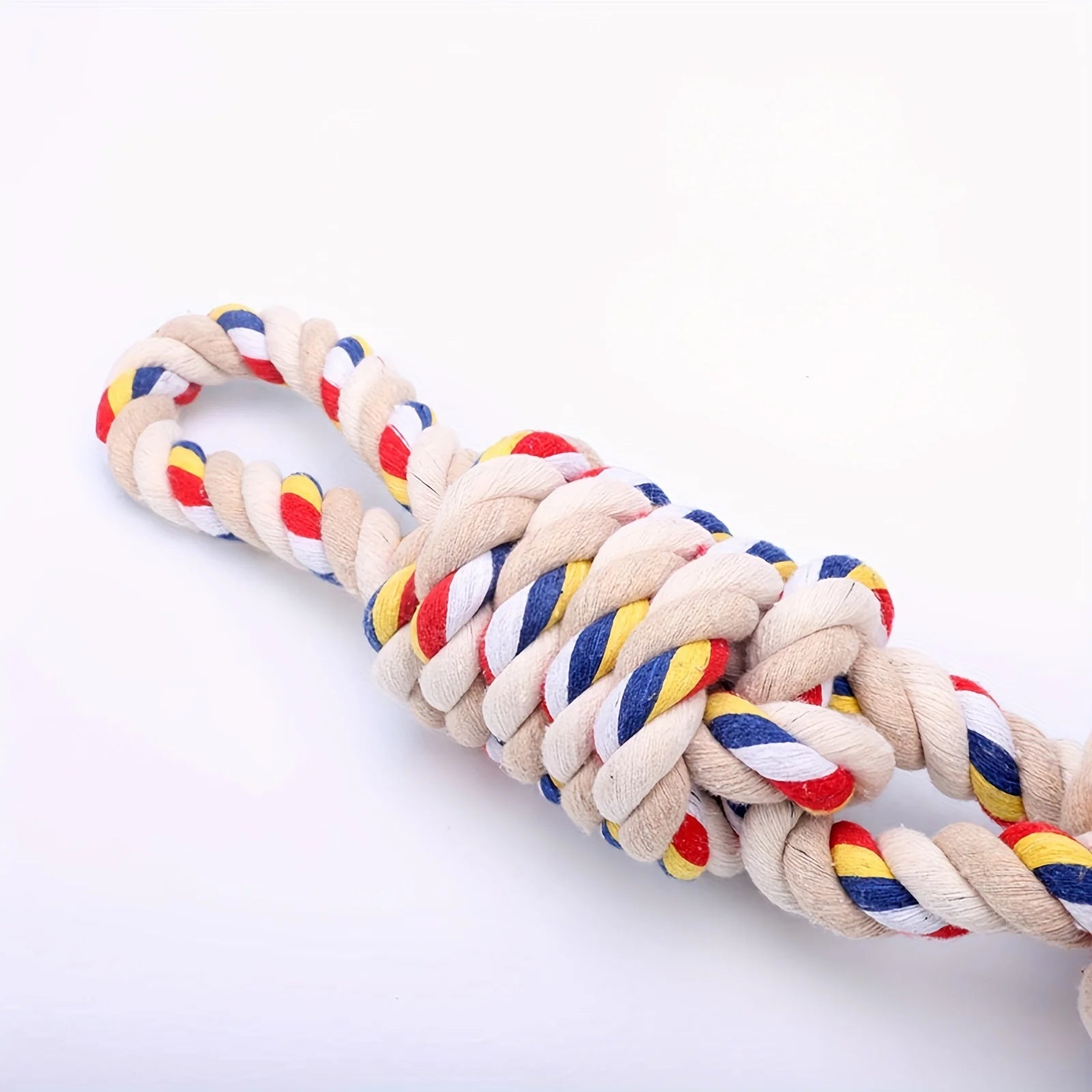 Made from 100% natural cotton, this heavy‑duty rope toy stands up to aggressive chewers while cleaning teeth and reducing plaque naturally. Ideal for interactive tug games, solo fidgeting, or fetch, it keeps your dog entertained and supports healthy gums - Luxempirez