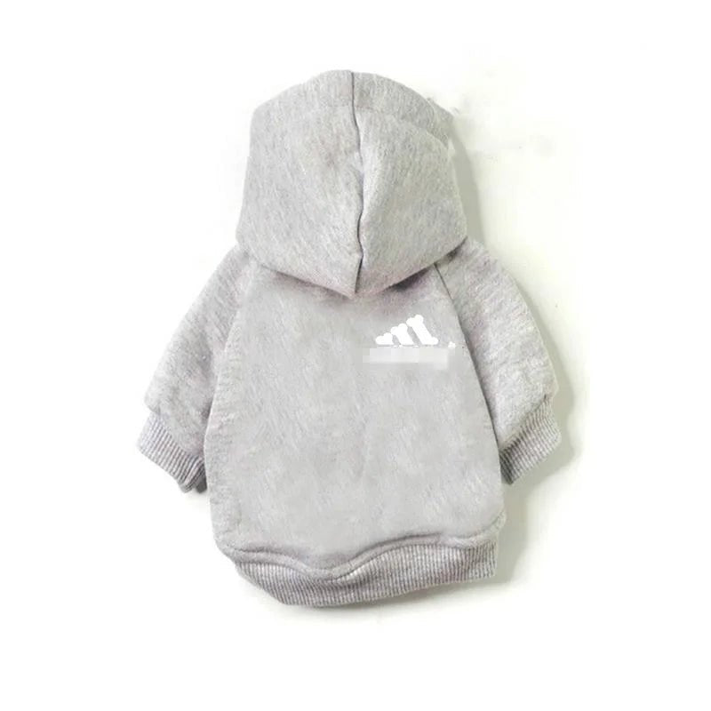 Turn playtime into a fashion statement with this iconic “Adidog” hoodie, created for dogs who love to move in style. The soft, cozy fabric and relaxed fit keep your pup warm and comfortable. - Luxempirez