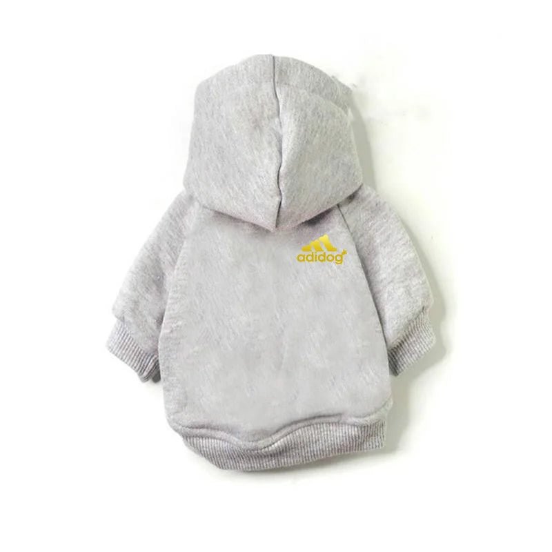 Turn playtime into a fashion statement with this iconic “Adidog” hoodie, created for dogs who love to move in style. The soft, cozy fabric and relaxed fit keep your pup warm and comfortable. - Luxempirez
