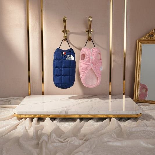 Wrap your dog in sophistication with our exclusive quilted luxury jacket, available in vibrant colors to suit every personality. Each piece features high - quality, plush padding and "The Dog Face" signature detail for a fashionable edge. - Luxempirez