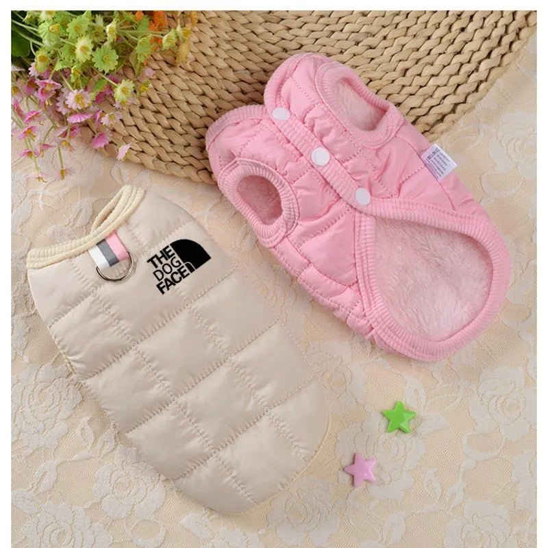 Wrap your dog in sophistication with our exclusive quilted luxury jacket, available in vibrant colors to suit every personality. Each piece features high - quality, plush padding and "The Dog Face" signature detail for a fashionable edge. - Luxempirez